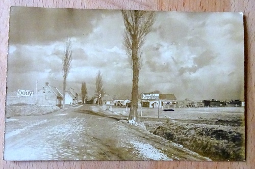   Ansichtskarte AK Gouy / Arleux. Straßenszene während des 1. Weltkrieges mit Barackenlager 