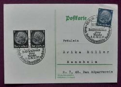   Postkarte mit 4 Rpf blau + 2er Block 1 Rpf schwarz (2 saubere Stempel "Berlin-Reichstag, Bolschewismus ohne Maske, Groe Antibolschewistische Ausstellung 6.11.1937 - 9.1.1938) 