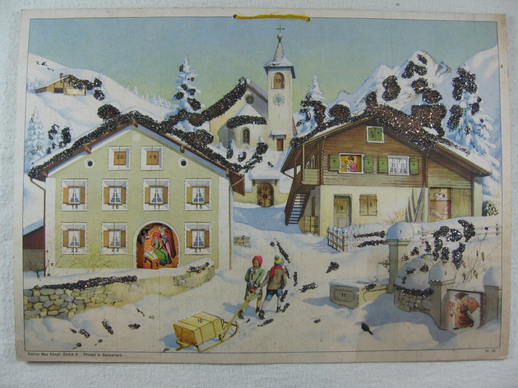   Adventskalender: Gebirgsdorf im Winter. 
